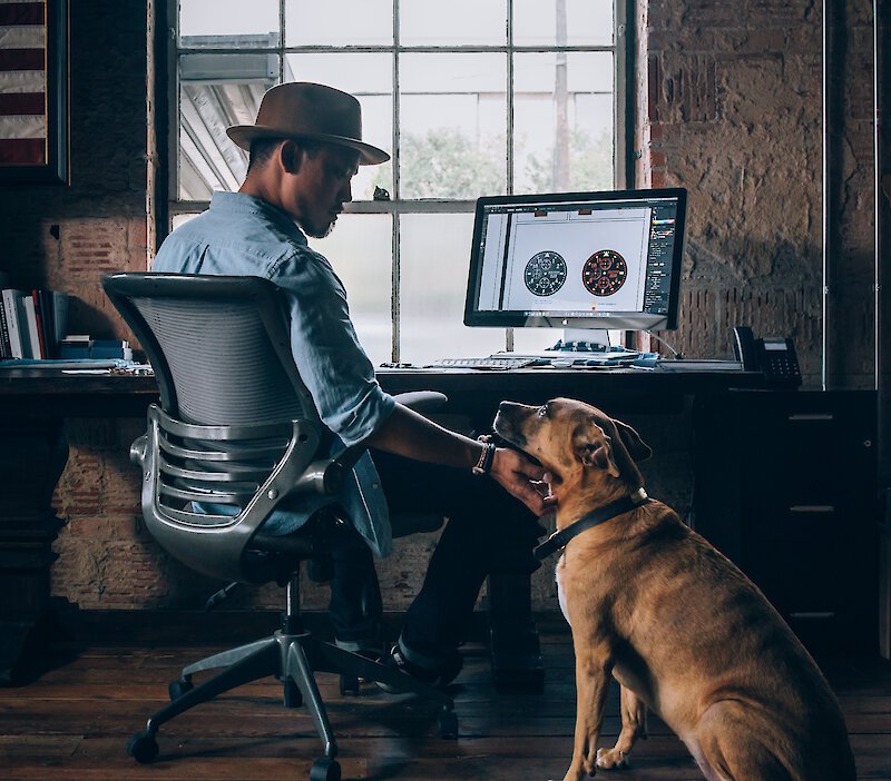 Man working from home with his dog